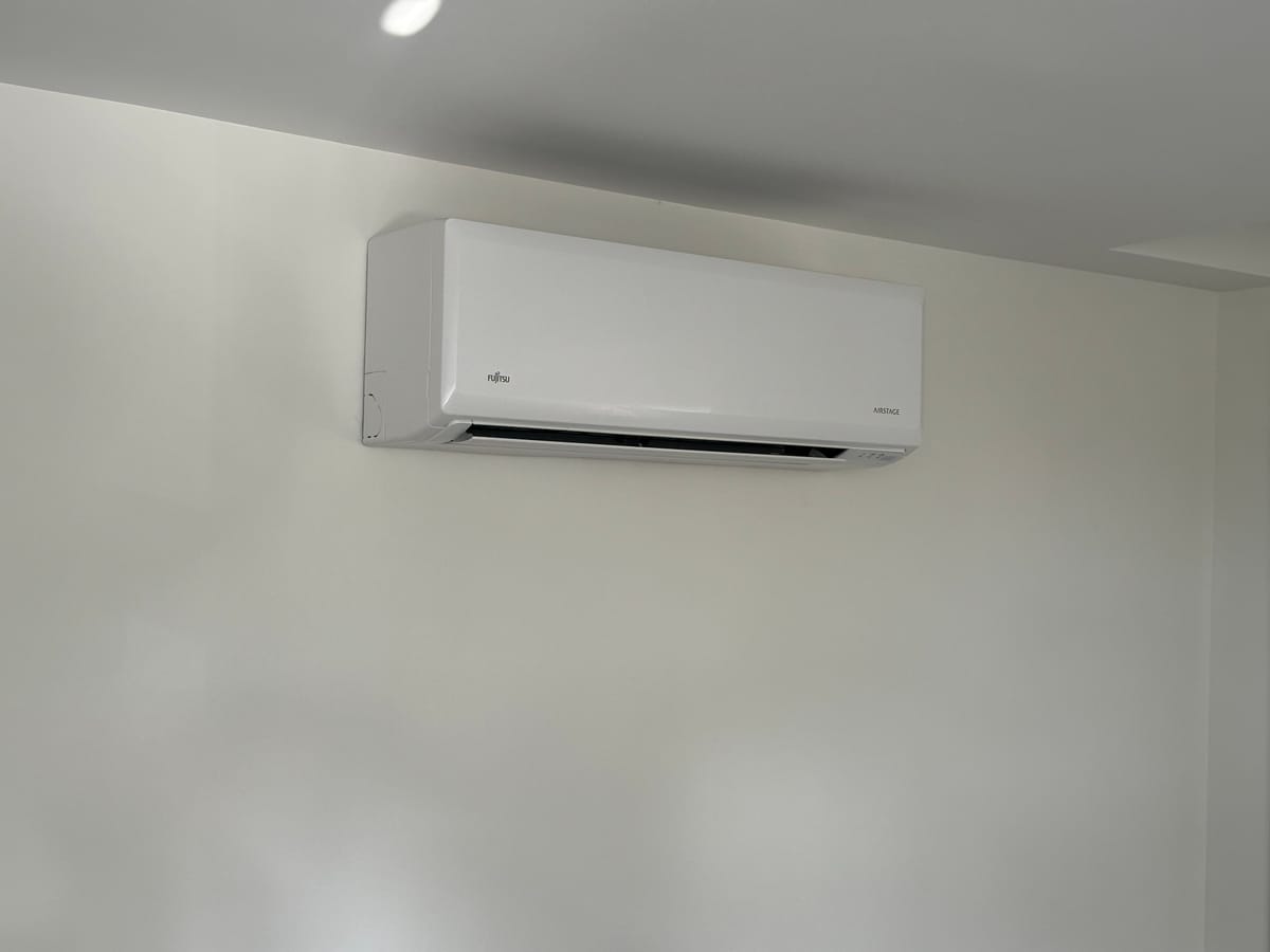 Fujitsu Airstage high-wall unit — a clean, discreet indoor finish.