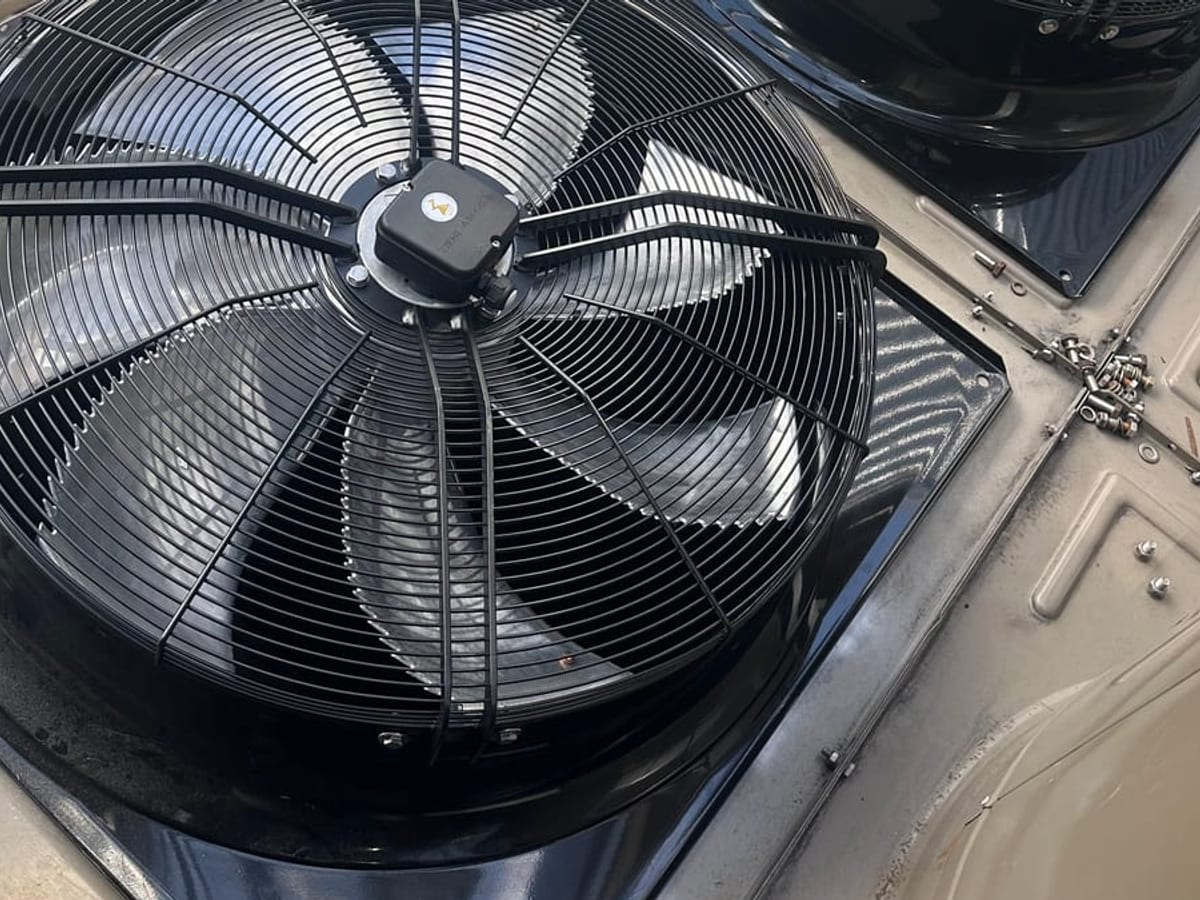 New condenser fans fitted to a commercial refrigeration plant.
